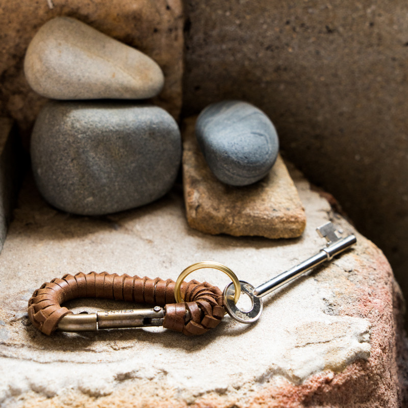 Stones stacked with our explorer keyring from Monsoon Living, Newcastle